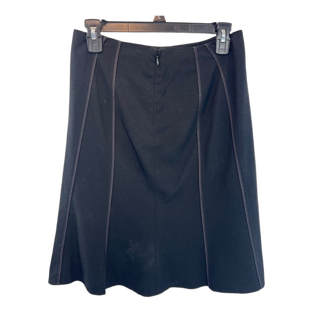 The limited stretch black a-line skirt